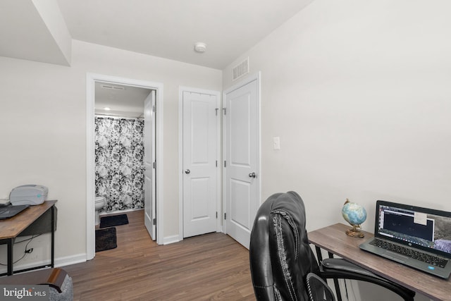 office area with dark hardwood / wood-style floors