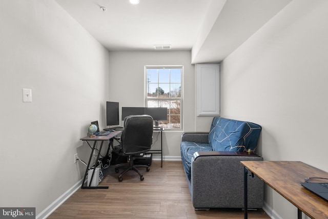 office space featuring hardwood / wood-style floors