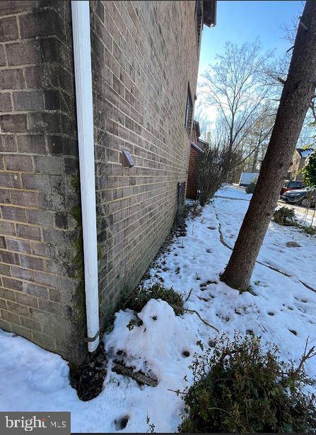 view of snow covered property