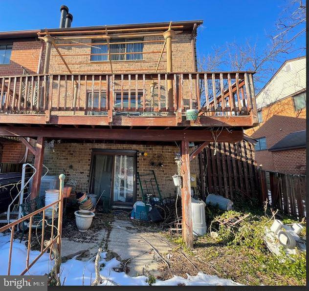 rear view of house with a deck