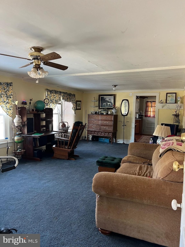 living room featuring carpet floors, plenty of natural light, and ceiling fan