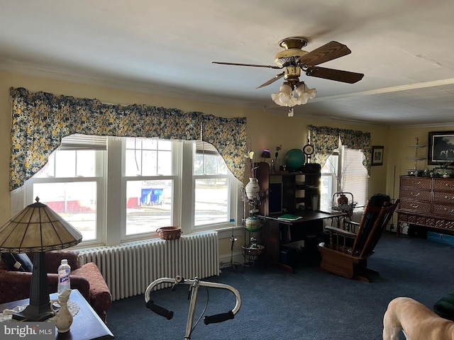 interior space with radiator, crown molding, ceiling fan, and carpet flooring