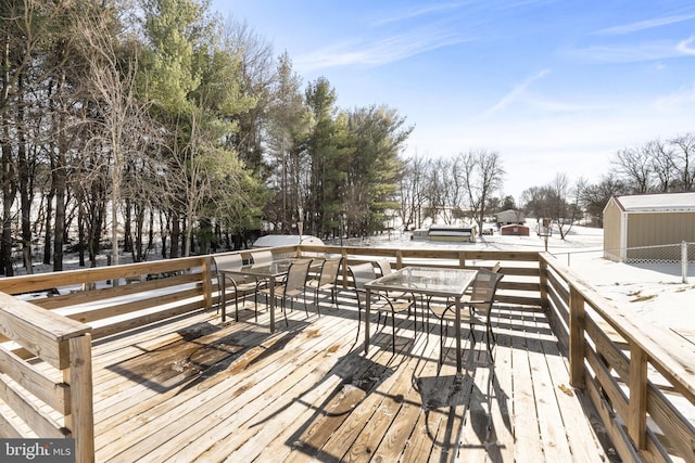 view of snow covered deck