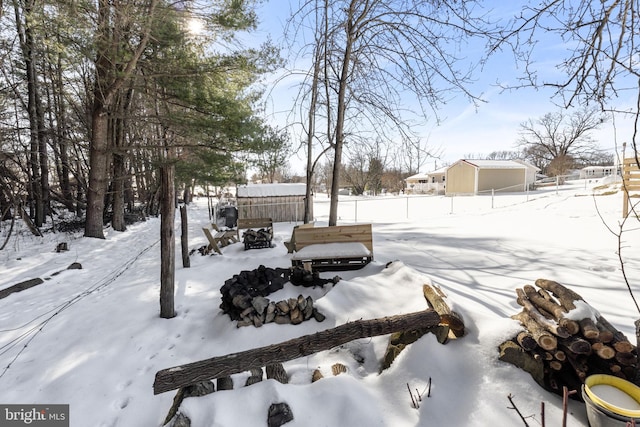 view of yard covered in snow