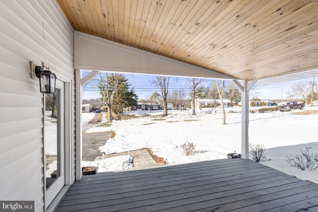 view of snow covered deck