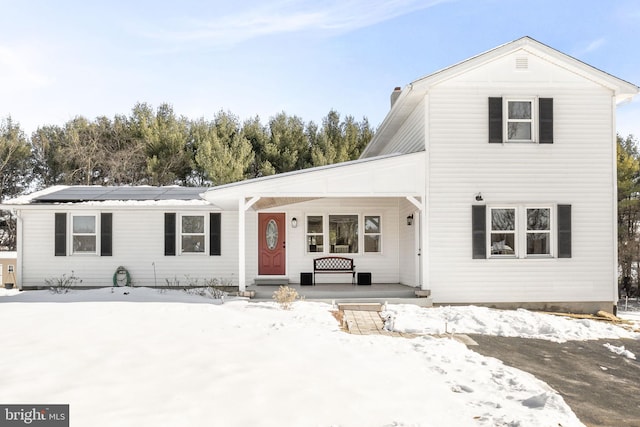 view of front of property featuring covered porch