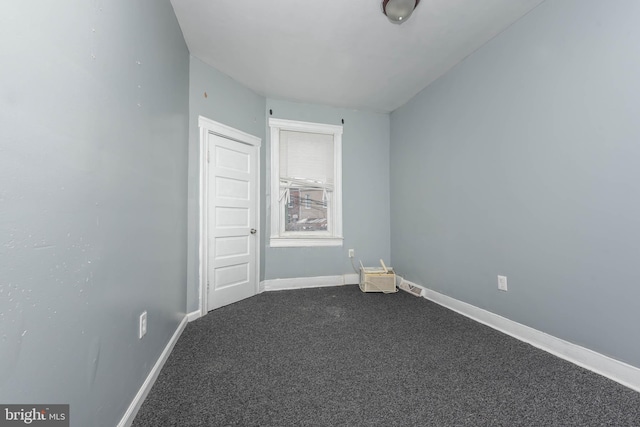 view of carpeted spare room