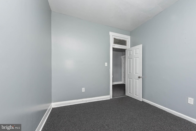 empty room featuring carpet