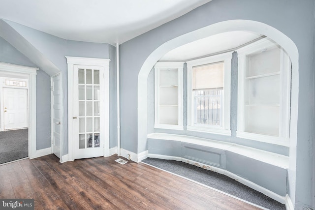 interior space with dark wood-type flooring