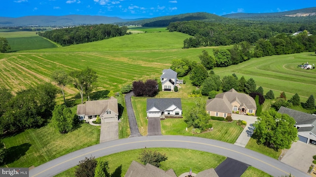 drone / aerial view featuring a mountain view