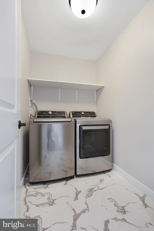 laundry area featuring washer and dryer