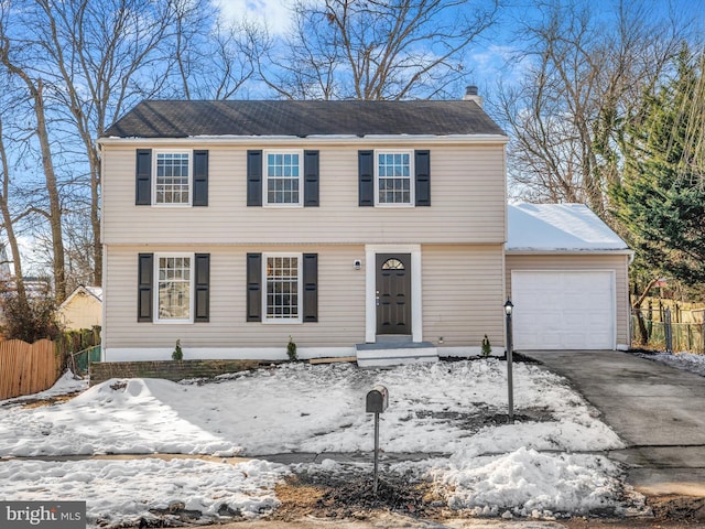 view of front of property featuring a garage