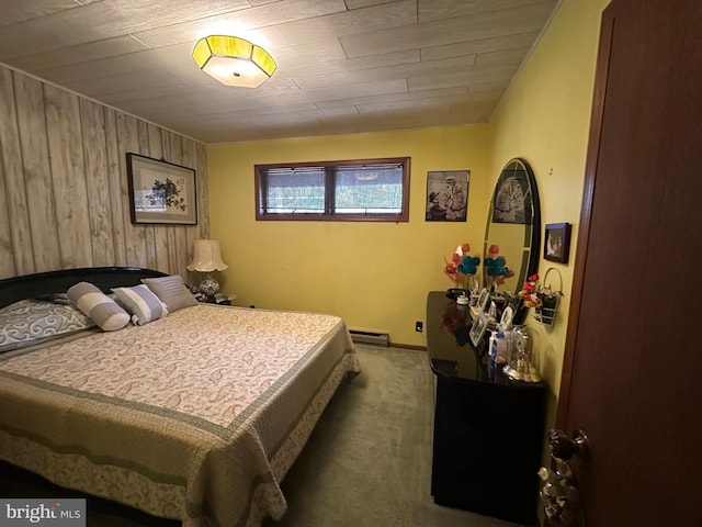 bedroom featuring carpet flooring, a baseboard radiator, wooden walls, and wooden ceiling