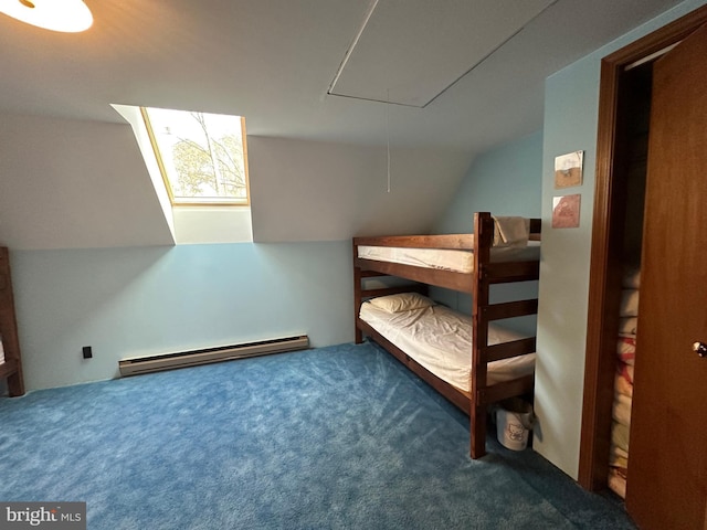 bedroom featuring vaulted ceiling, carpet floors, and baseboard heating