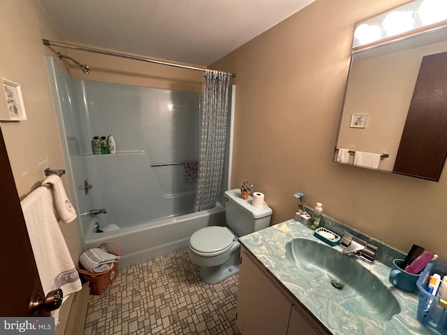 full bathroom with shower / tub combo, vanity, tile patterned floors, and toilet