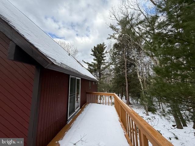 view of snow covered deck