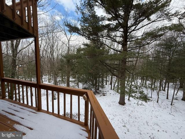 view of snow covered deck