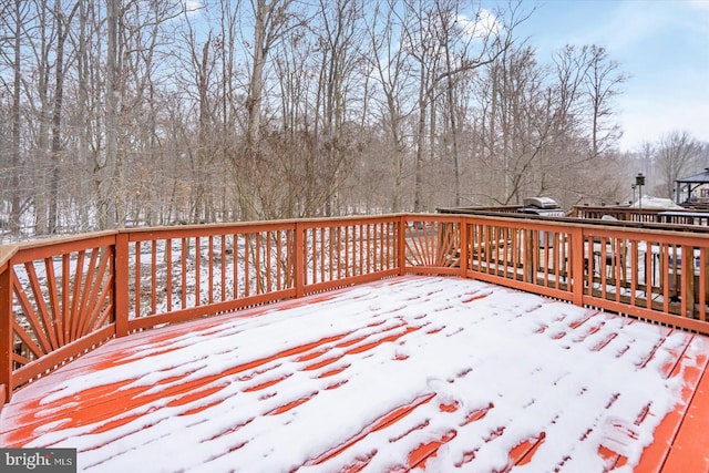 view of snow covered deck