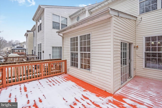 view of snow covered deck