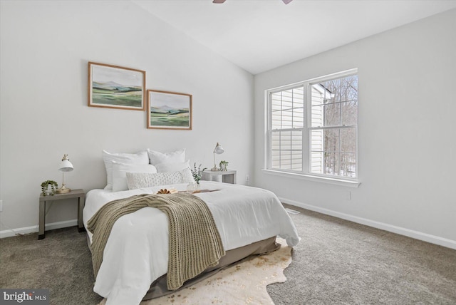 carpeted bedroom featuring ceiling fan and lofted ceiling