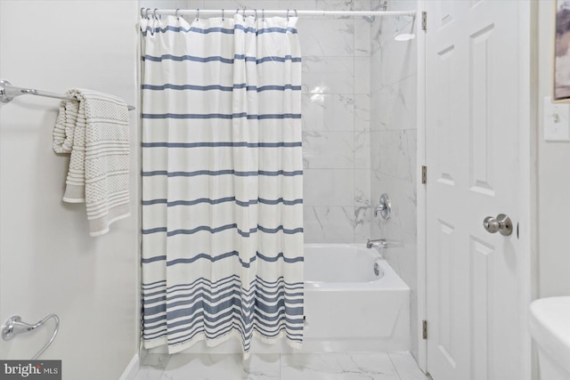 bathroom with shower / tub combo