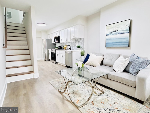 living room with light wood-type flooring