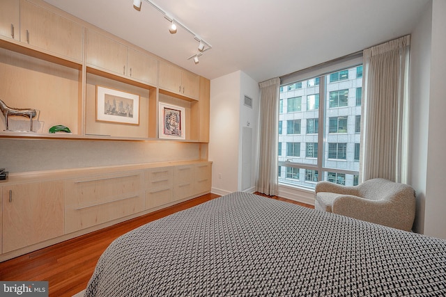 bedroom featuring light wood-type flooring