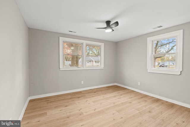 unfurnished room featuring ceiling fan and light hardwood / wood-style floors