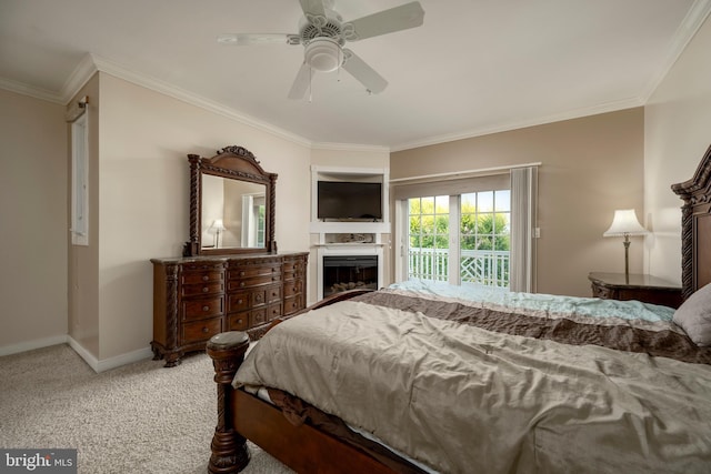 bedroom featuring ceiling fan, carpet, ornamental molding, and access to outside