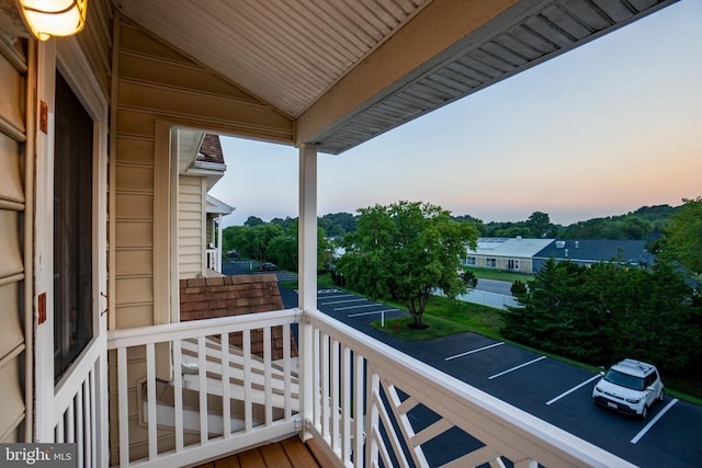 view of balcony at dusk