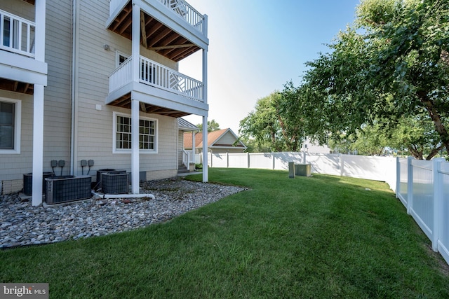 view of yard with central AC unit