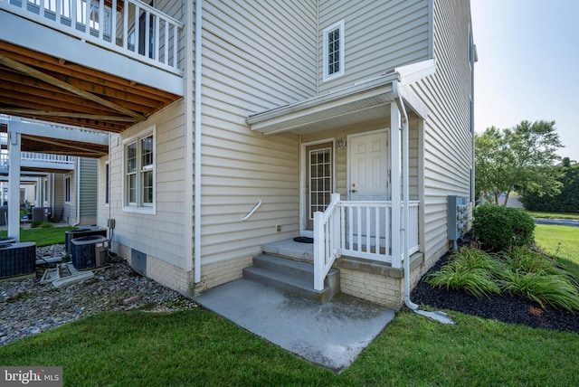 doorway to property with central air condition unit