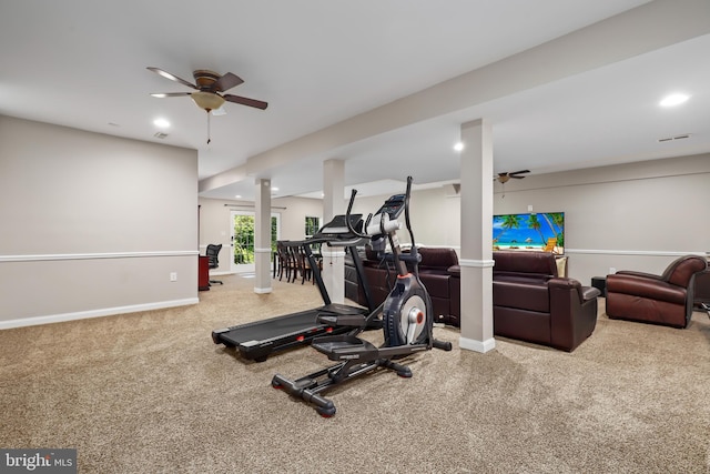 workout room featuring ceiling fan and carpet floors