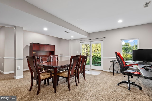 view of carpeted dining space