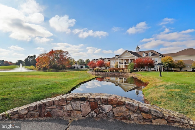 view of yard with a water view