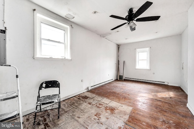 1848 N 21st St, Philadelphia, PA 19121 - spare room featuring hardwood / wood-style flooring, ceiling fan, and a baseboard radiator