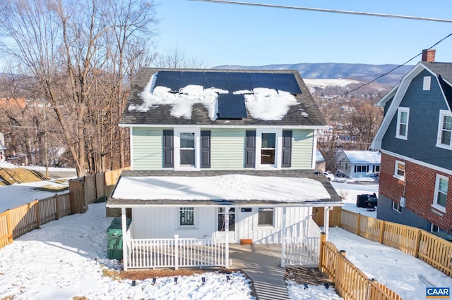 view of front of property featuring a mountain view