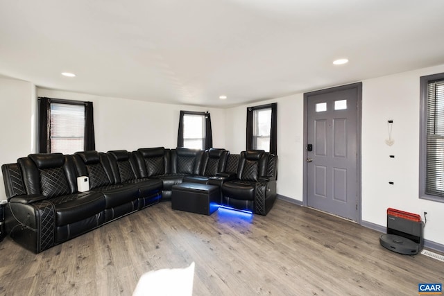 living room with light hardwood / wood-style floors