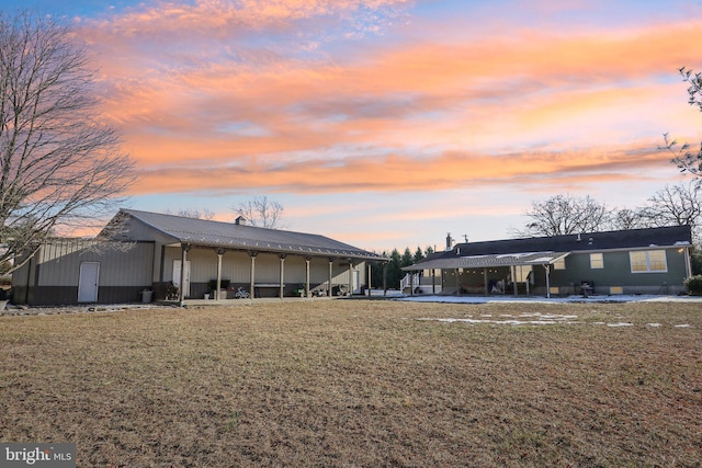 exterior space featuring a lawn