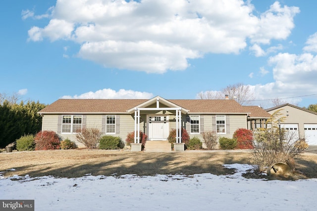 view of front of home with a garage