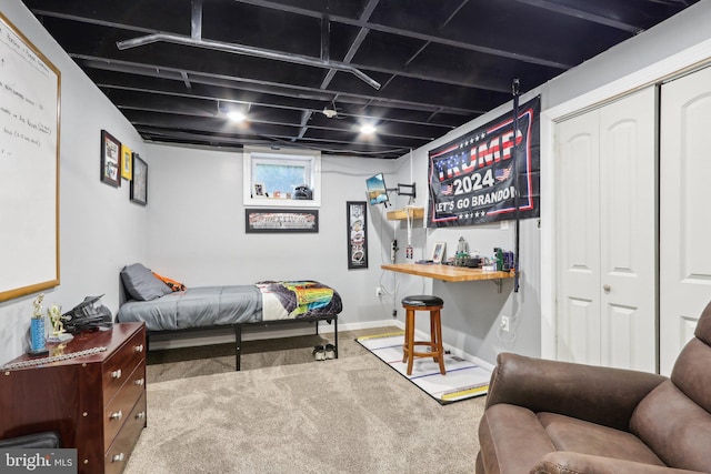 carpeted bedroom with a closet