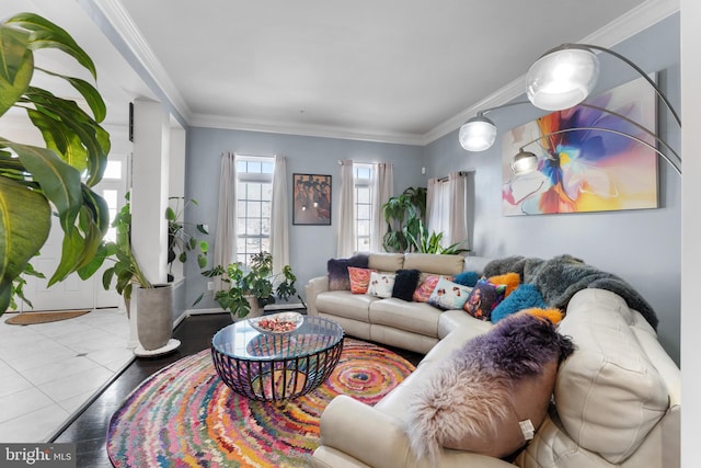 living room featuring light tile patterned floors and crown molding