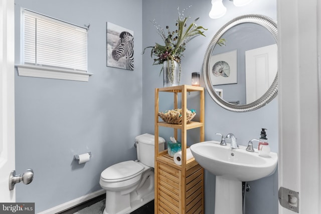 bathroom with sink and toilet