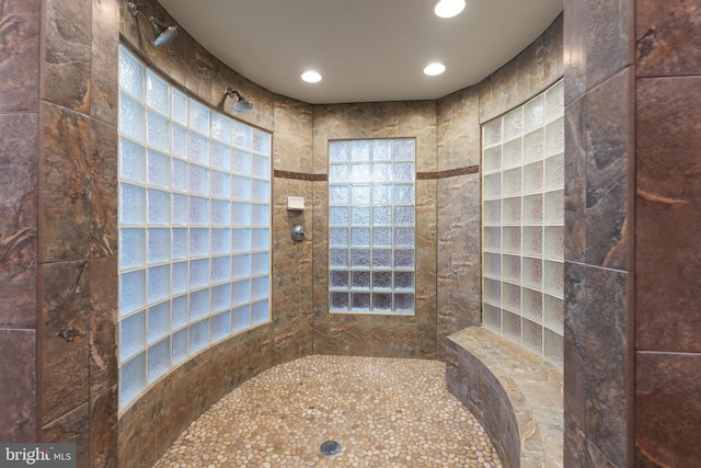 bathroom with tiled shower