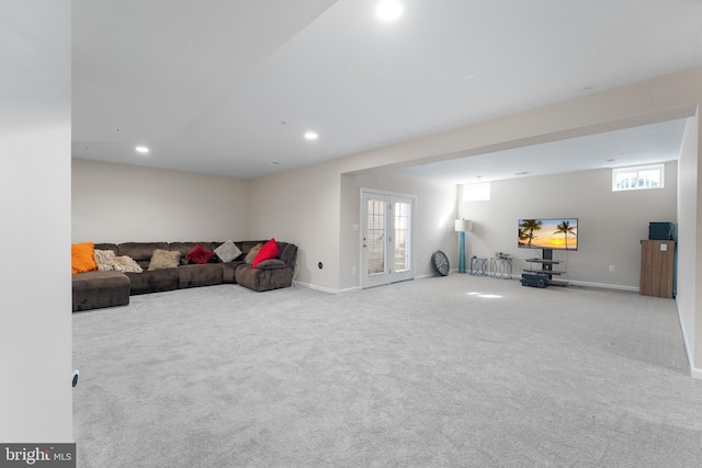 living room with light colored carpet and french doors