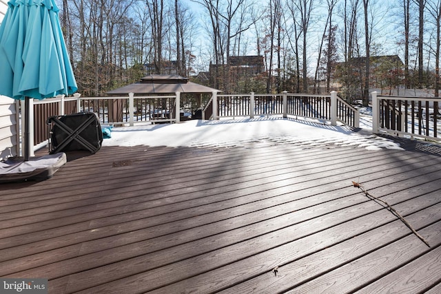 wooden terrace with a gazebo