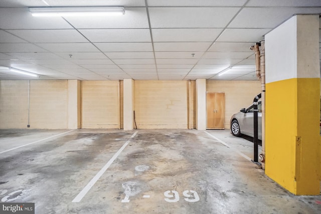 basement with a drop ceiling