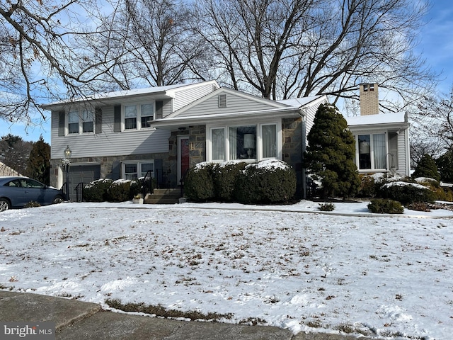 view of front of house with a garage