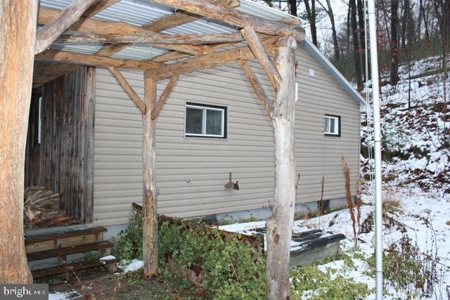 view of snow covered property