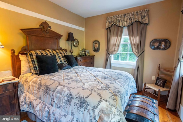 bedroom with light hardwood / wood-style flooring